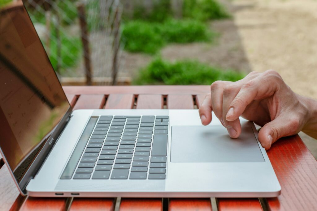 Laptop on desk displaying marketing strategy and creative content planning for a small business.